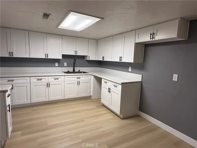 a bathroom with a sink a toilet and a bathtub