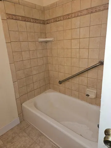 a bathroom with a bathtub