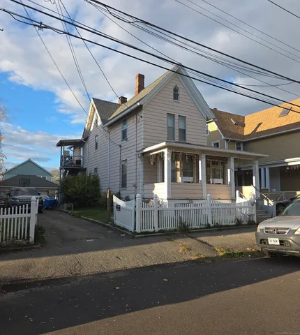 a front view of a house with a garage