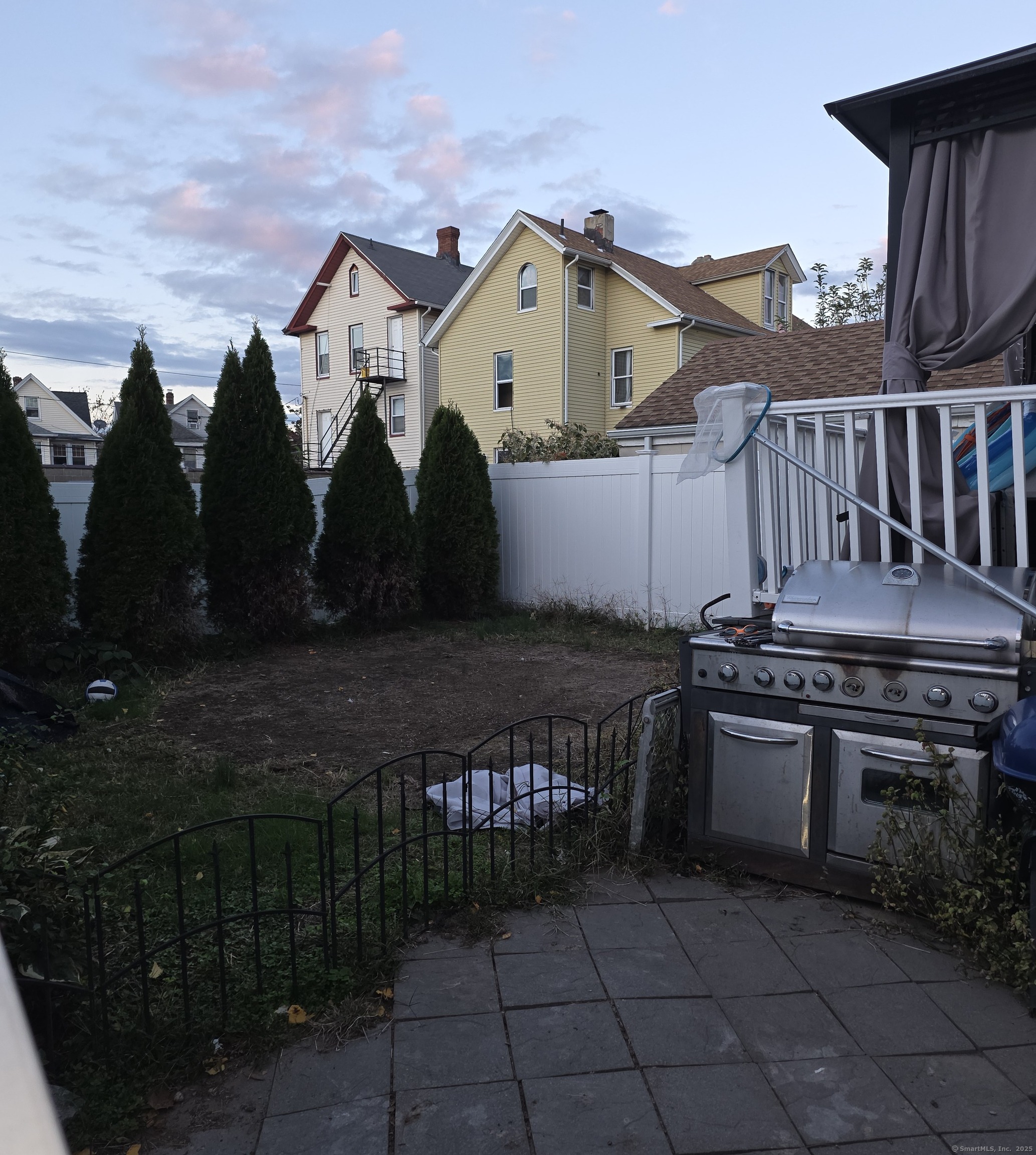162 Cottage Street Bridgeport, CT 06605 - Photo 5 of 7 a view of a house with a yard