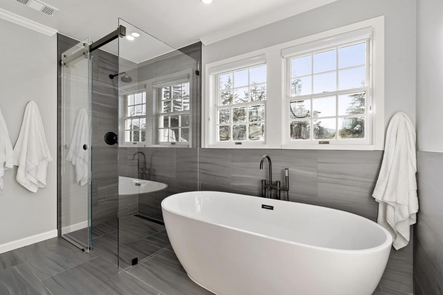 1652 Ralston Avenue Belmont, CA 94002 - Photo 17 of 45 a white bath tub sitting next to a bathroom sink