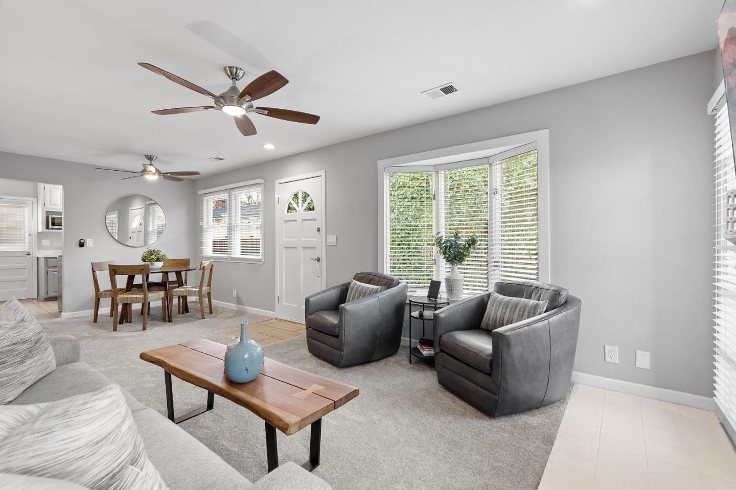 1652 Ralston Avenue Belmont, CA 94002 - Photo 31 of 45 a living room with furniture and a large window