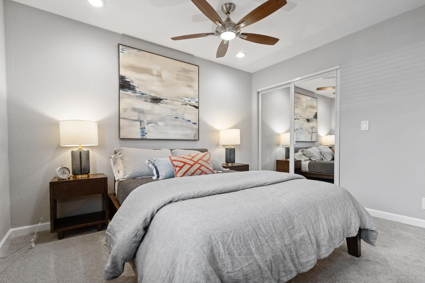 1652 Ralston Avenue Belmont, CA 94002 - Photo 35 of 45 a bedroom with a large bed and a chandelier