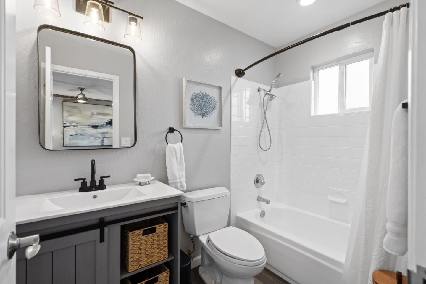 1652 Ralston Avenue Belmont, CA 94002 - Photo 37 of 45 a bathroom with a sink toilet and shower