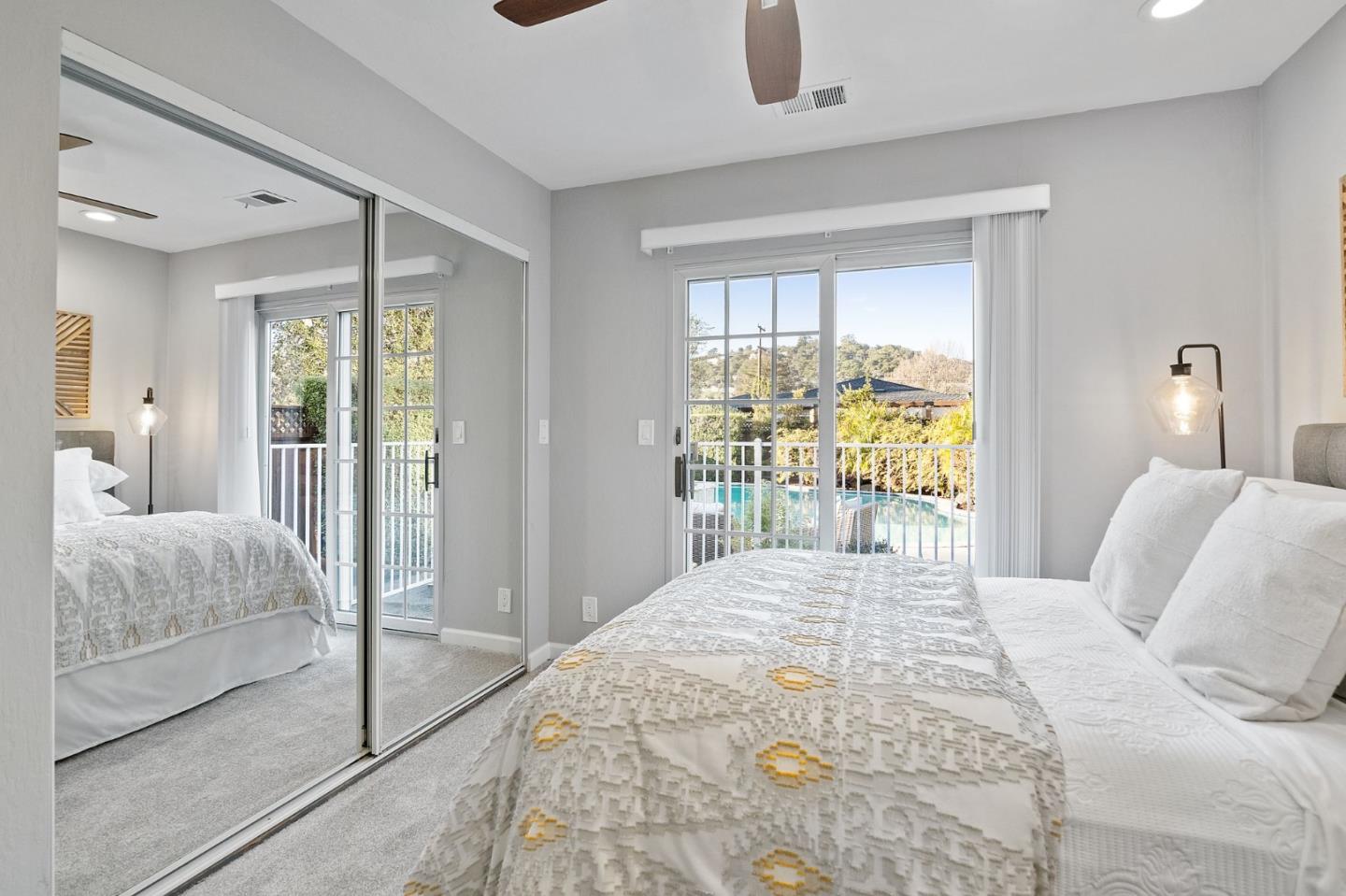 1652 Ralston Avenue Belmont, CA 94002 - Photo 39 of 45 a bedroom with a large bed and a large window