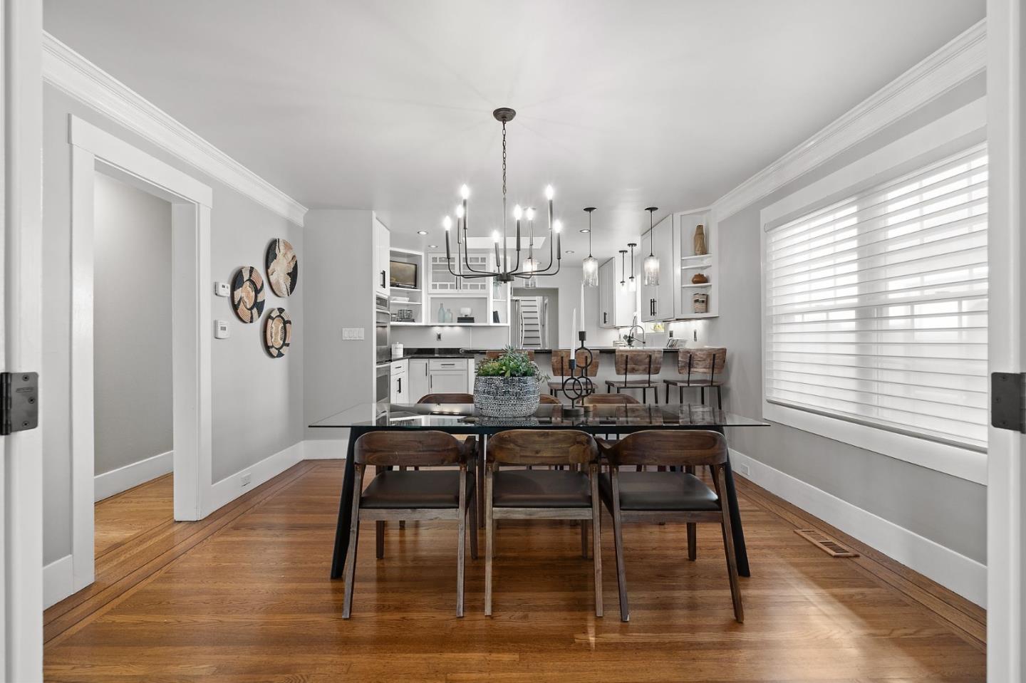 1652 Ralston Avenue Belmont, CA 94002 - Photo 7 of 45 a view of a dining room with furniture window and wooden floor