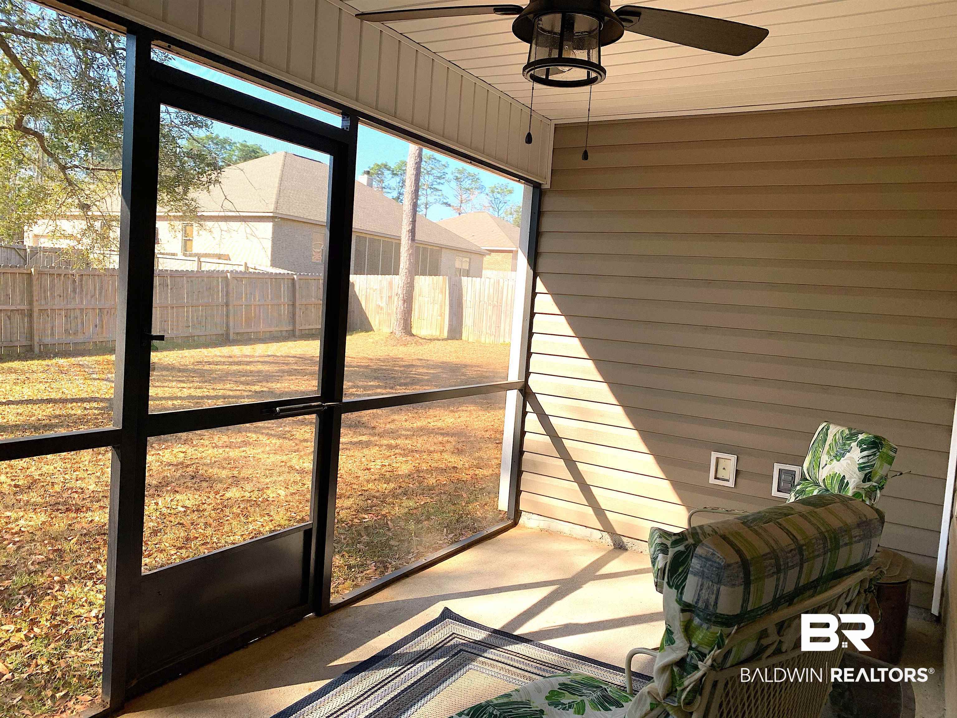 12092 Chaucer Avenue Daphne, AL 36526 - Photo 5 of 27 Screened Back Porch
