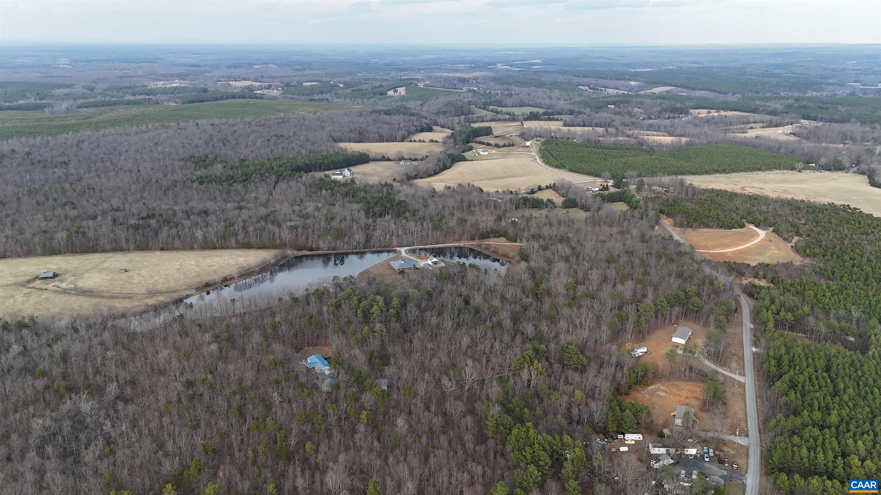949 Austin Road Gladstone, VA 24553 - Photo 17 of 20 a view of a lake in middle of the town