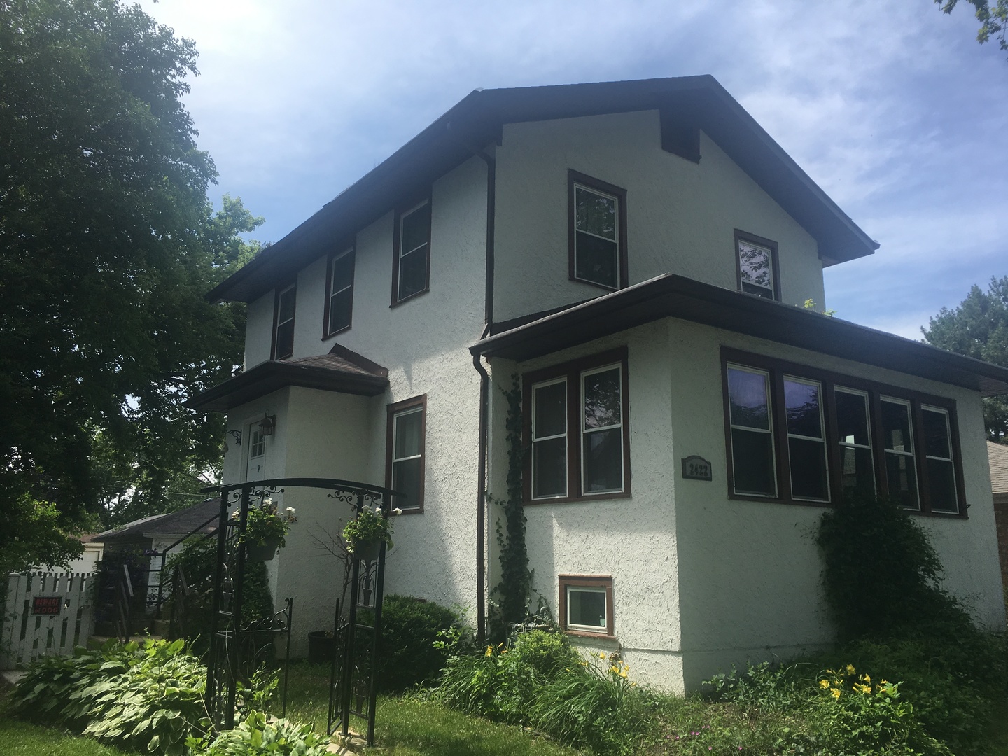 2422 Forest Avenue North Riverside, IL 60546 - Photo 1 of 19 a front view of a house with plants