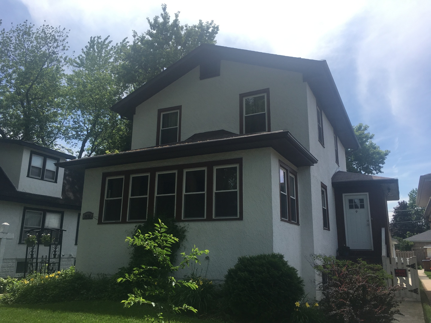 2422 Forest Avenue North Riverside, IL 60546 - Photo 2 of 19 a front view of a house with a garden