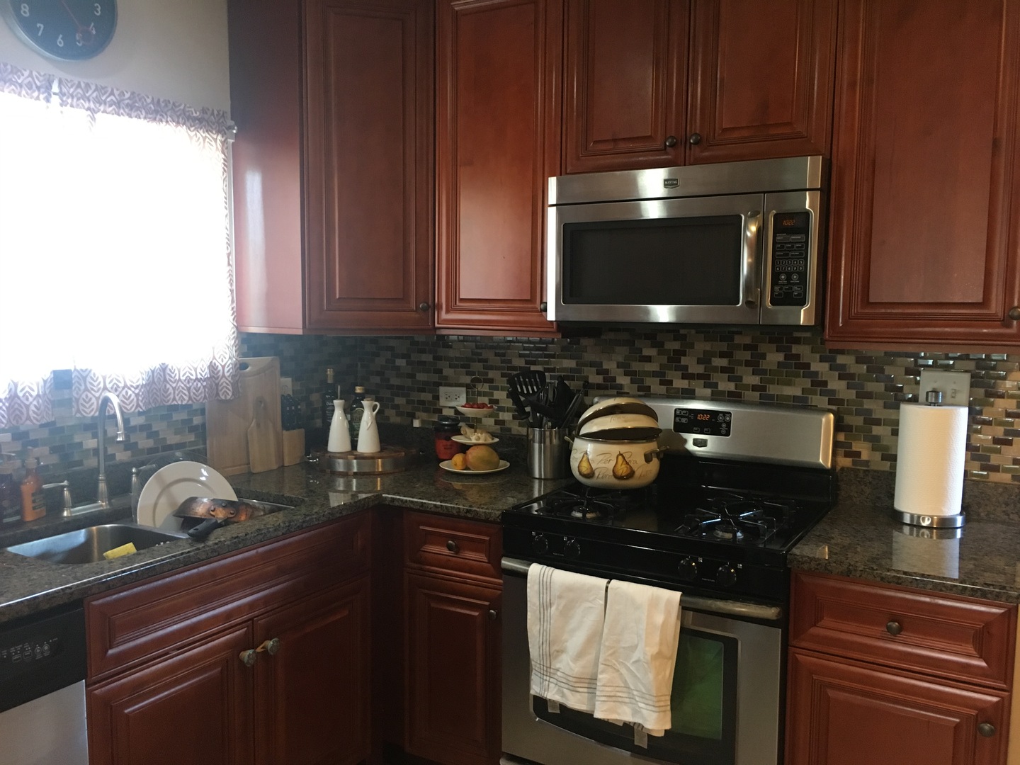 2422 Forest Avenue North Riverside, IL 60546 - Photo 12 of 19 a kitchen with a sink a stove and cabinets
