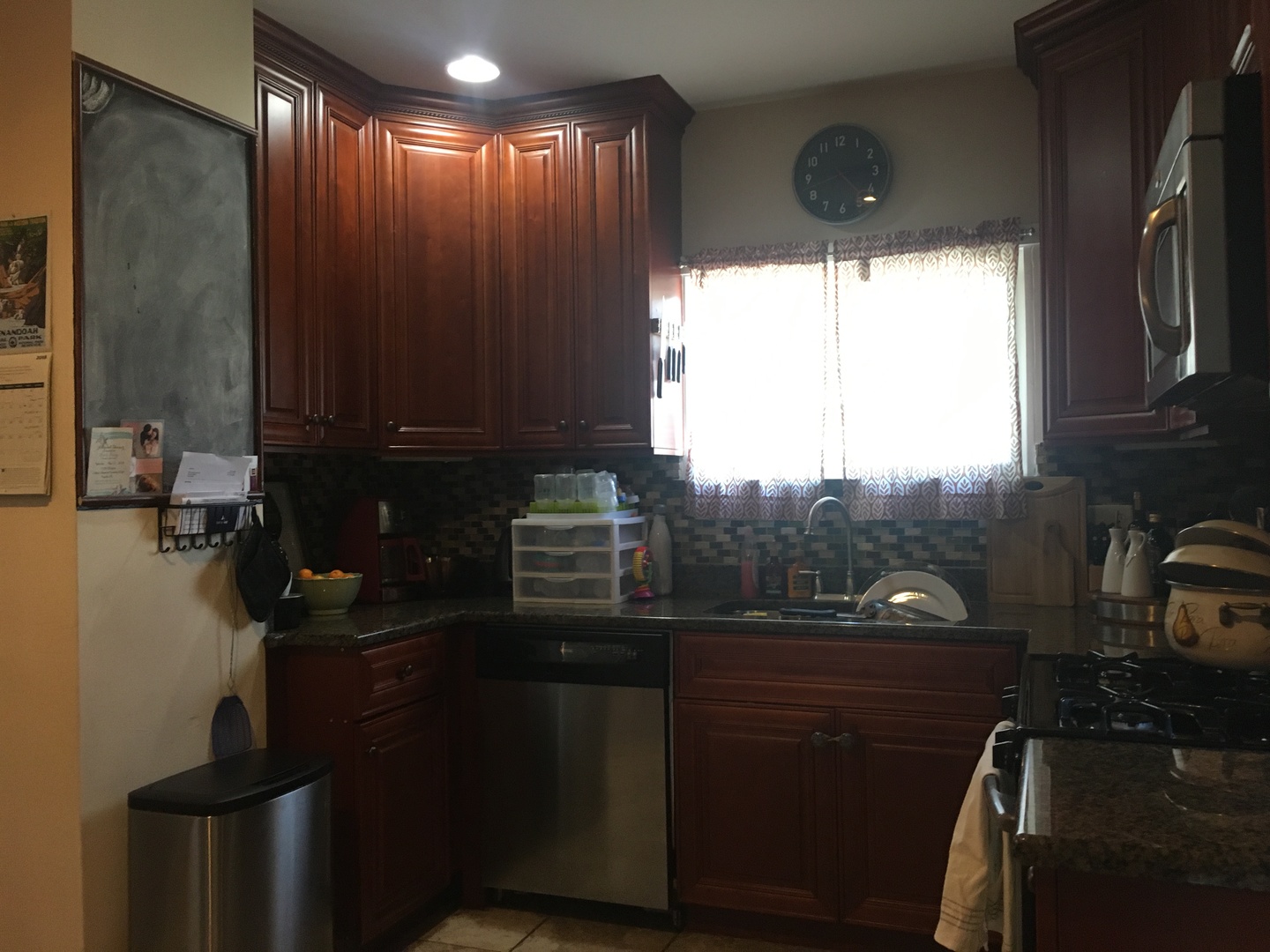 2422 Forest Avenue North Riverside, IL 60546 - Photo 10 of 19 a kitchen with a sink stainless steel appliances and cabinets