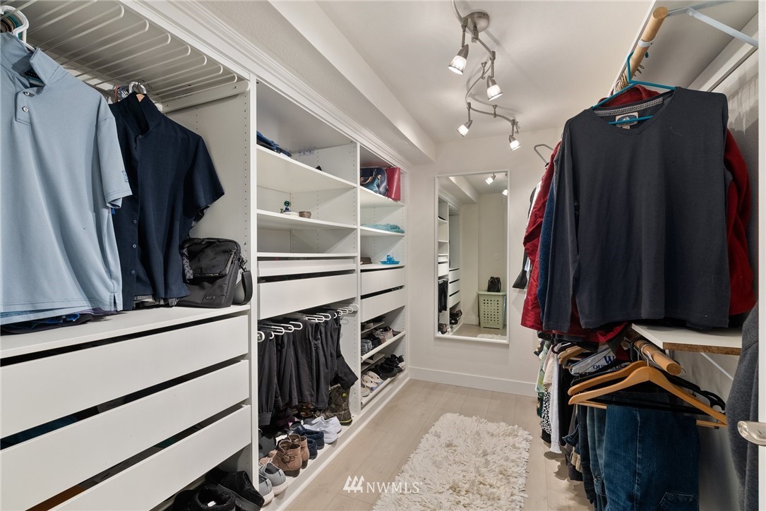 469 Brown Road East Chehalis, WA 98532 - Photo 17 of 35 a view of walk in closet with clothes and shoes
