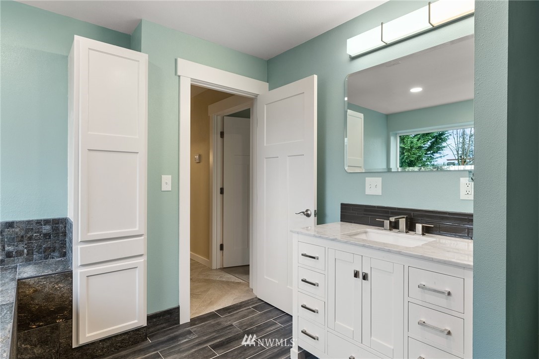 469 Brown Road East Chehalis, WA 98532 - Photo 19 of 35 a bathroom with a sink and a mirror
