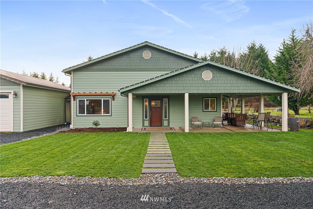 469 Brown Road East Chehalis, WA 98532 - Photo 2 of 35 a front view of a house with a garden