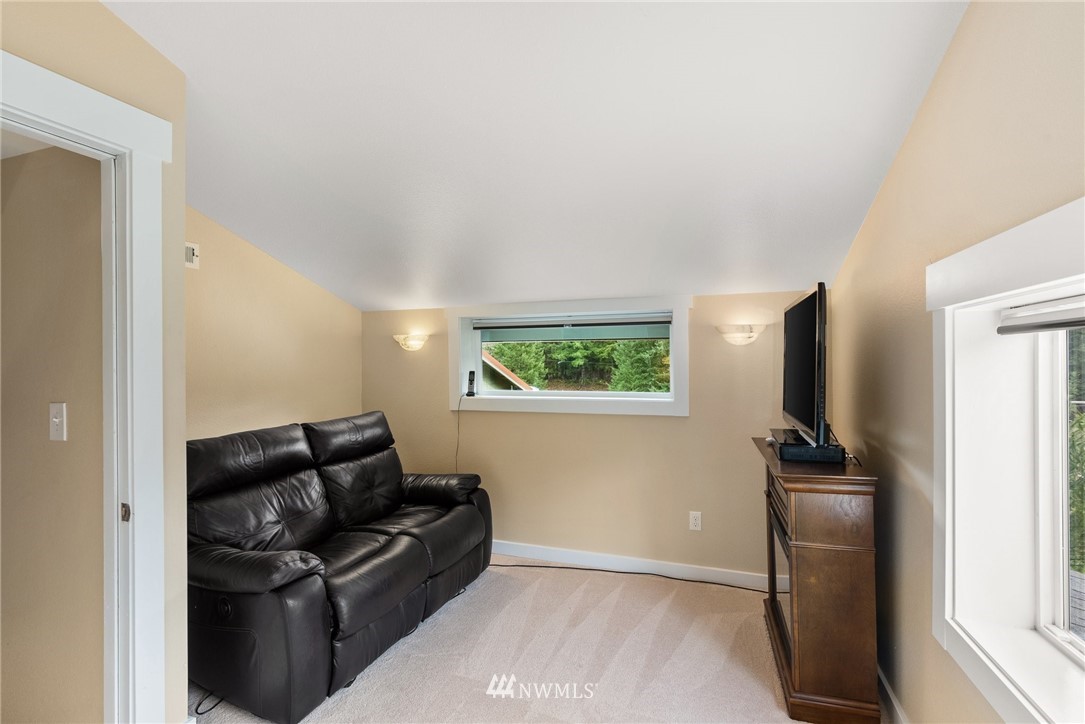 469 Brown Road East Chehalis, WA 98532 - Photo 22 of 35 a living room with furniture and a flat screen tv