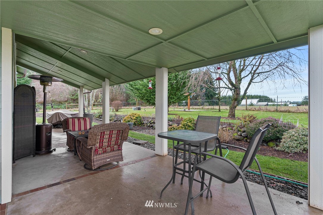 469 Brown Road East Chehalis, WA 98532 - Photo 27 of 35 a view of a patio with chairs and backyard