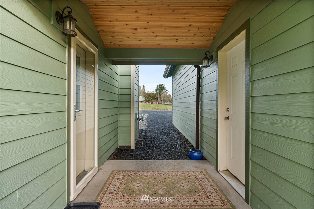 469 Brown Road East Chehalis, WA 98532 - Photo 32 of 35 a view of a pathway door with wooden floor