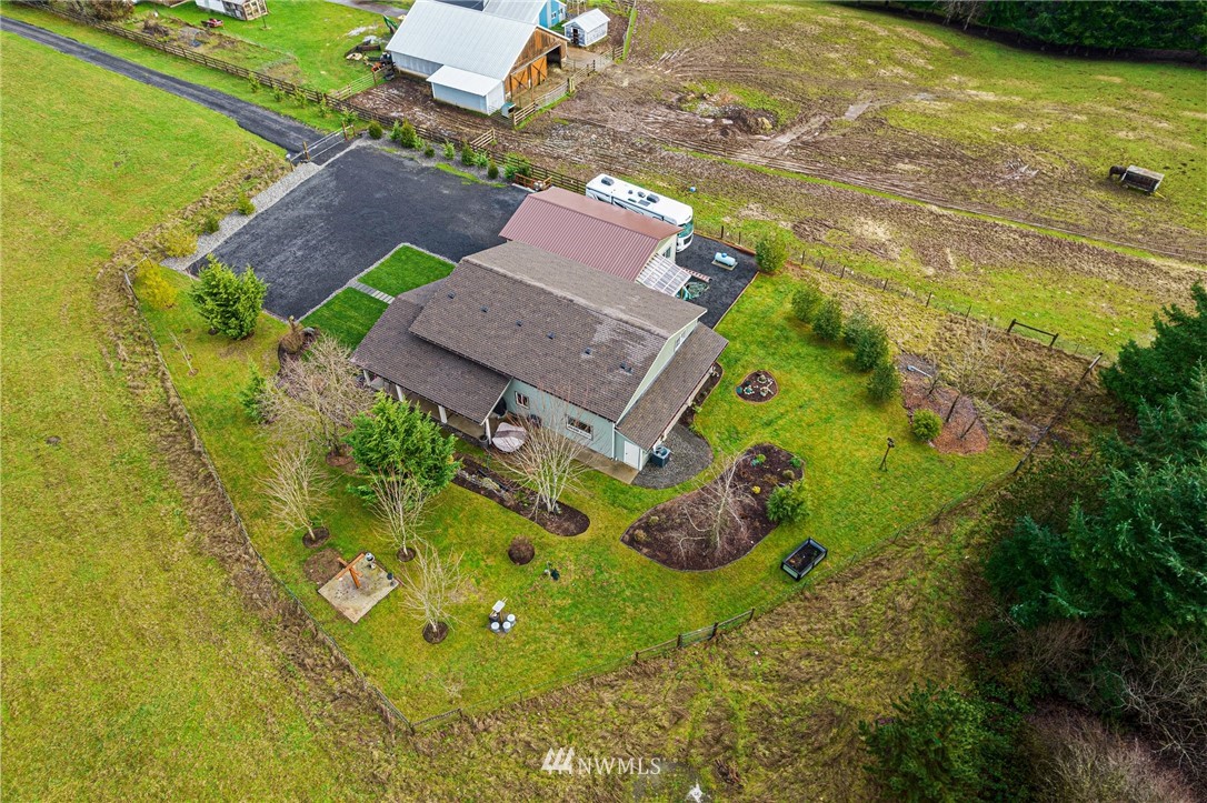 469 Brown Road East Chehalis, WA 98532 - Photo 33 of 35 an aerial view of a house with a swimming pool