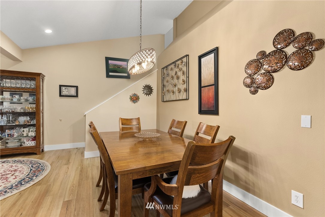469 Brown Road East Chehalis, WA 98532 - Photo 10 of 35 a view of a dining room with furniture and wooden floor