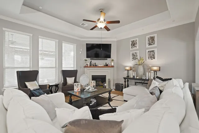 a view of a dining room with furniture and window