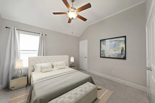 a bathroom with a bathtub shower sink vanity mirror and toilet
