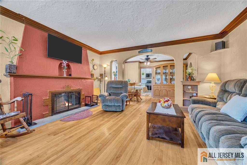 38 Simpson Avenue Edison, NJ 08817 - Photo 13 of 37 a living room with furniture and fireplace