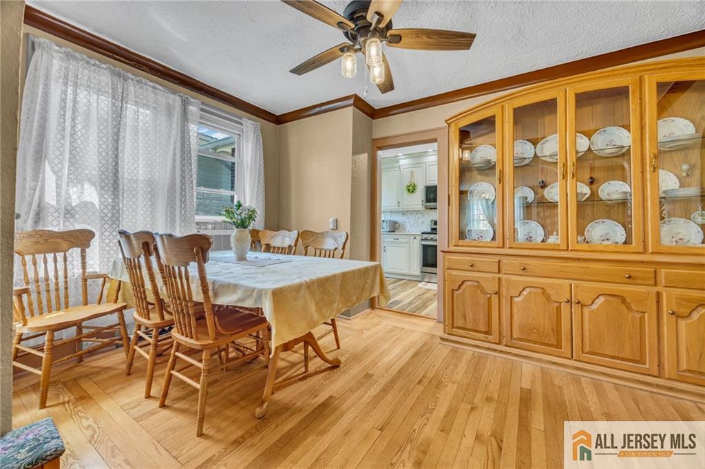 38 Simpson Avenue Edison, NJ 08817 - Photo 18 of 37 a view of a dining room with furniture window and outside view