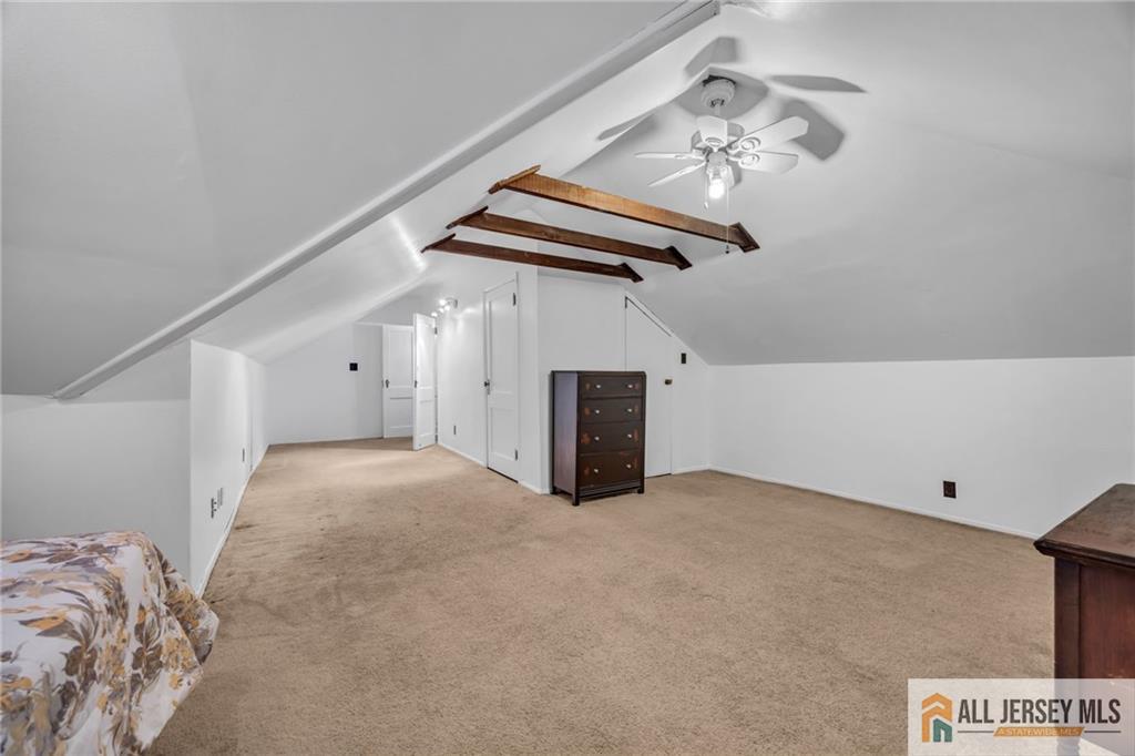38 Simpson Avenue Edison, NJ 08817 - Photo 25 of 37 a view of a livingroom with a staircase