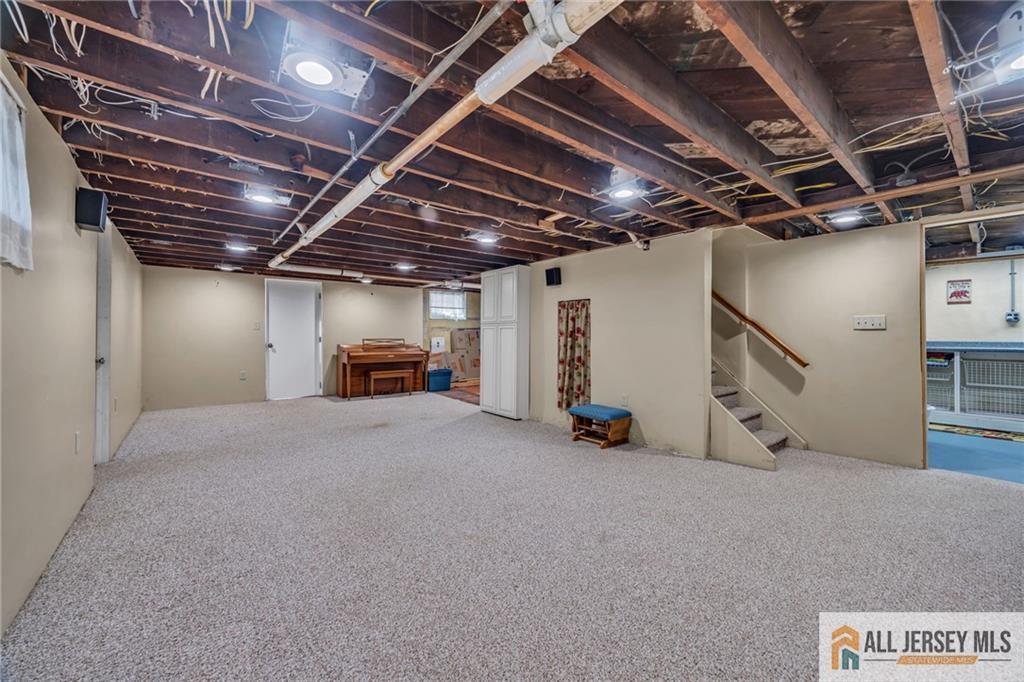 38 Simpson Avenue Edison, NJ 08817 - Photo 28 of 37 a view of parking garage with furniture
