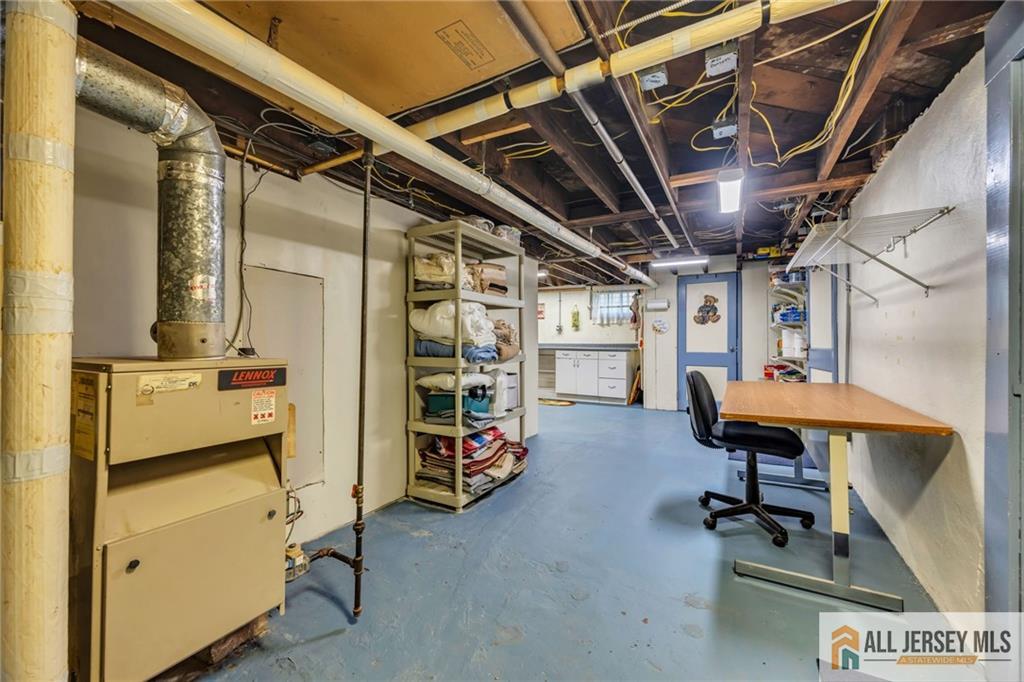 38 Simpson Avenue Edison, NJ 08817 - Photo 30 of 37 a view of a room with gym equipment