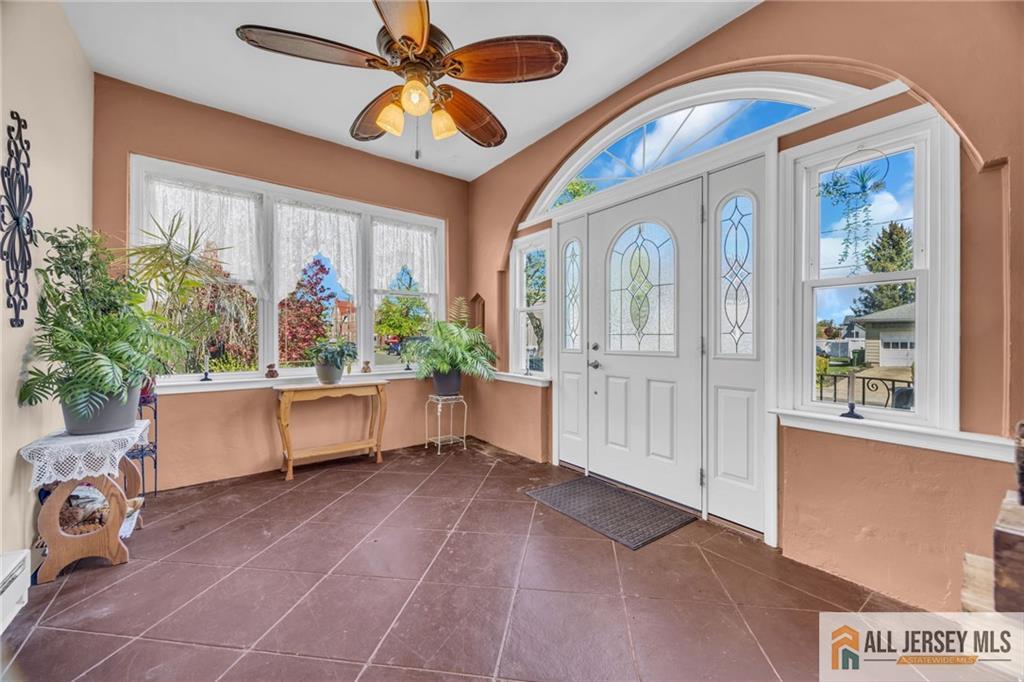 38 Simpson Avenue Edison, NJ 08817 - Photo 4 of 37 a view of an entryway with a workspace