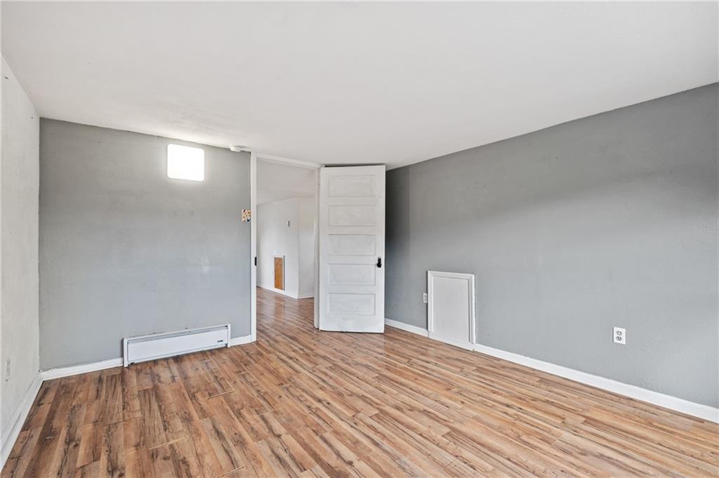 840 7th Street Verona, PA 15147 - Photo 24 of 32 a view of empty room with wooden floor