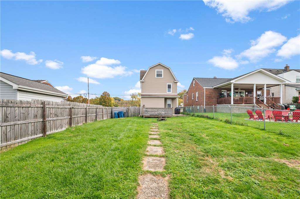 840 7th Street Verona, PA 15147 - Photo 28 of 32 a front view of a house with garden