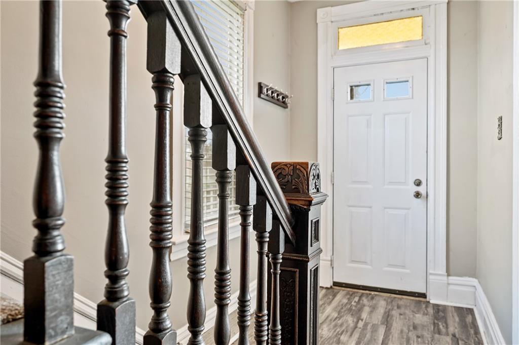 840 7th Street Verona, PA 15147 - Photo 4 of 32 a view of entryway with wooden floor and stairs