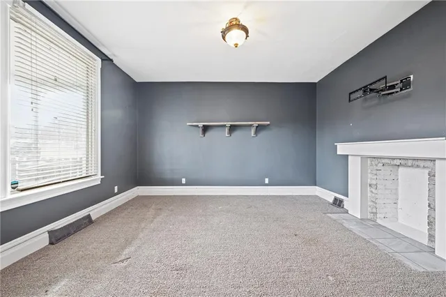 an empty room with windows