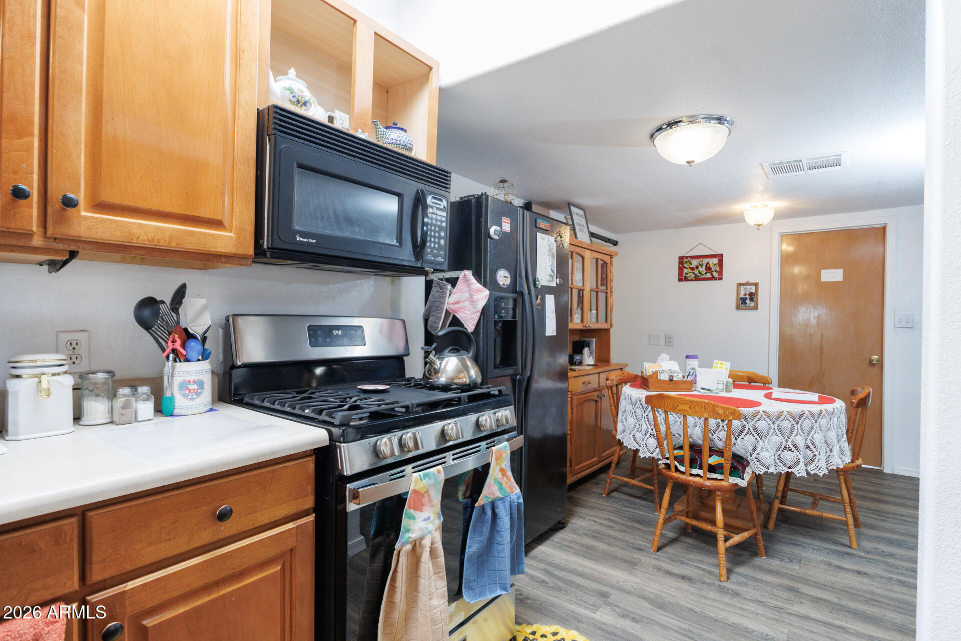 6185 East Monitor Street Picacho, AZ 85141 - Photo 49 of 55 a kitchen that has a table and chairs in it
