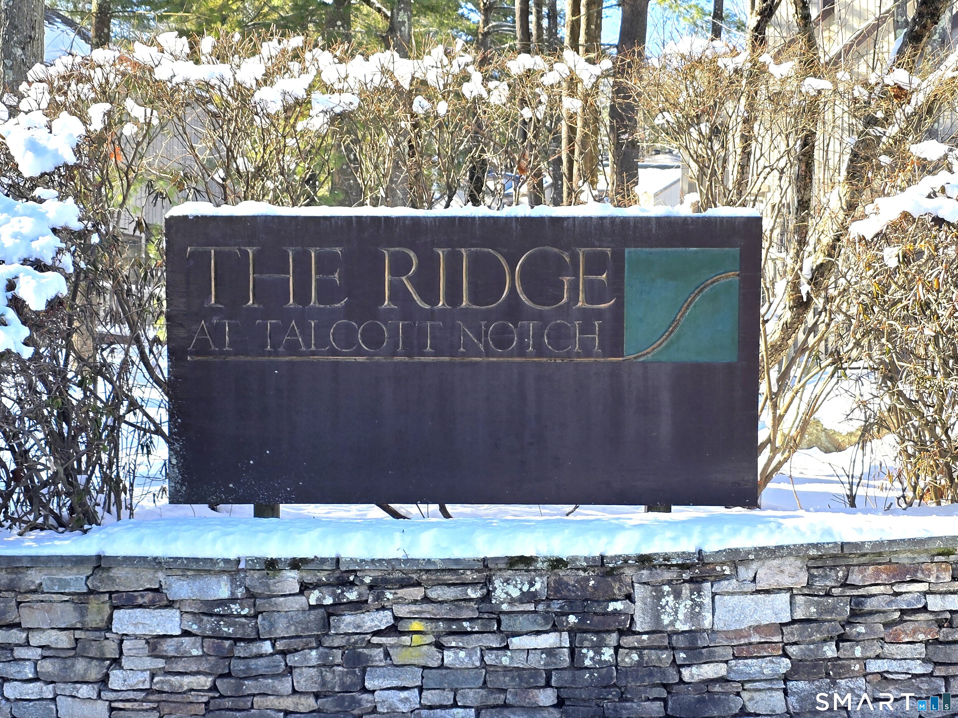 7 Staunton Court, Unit E Farmington, CT 06032 - Photo 28 of 29 a sign that is on the side of a road