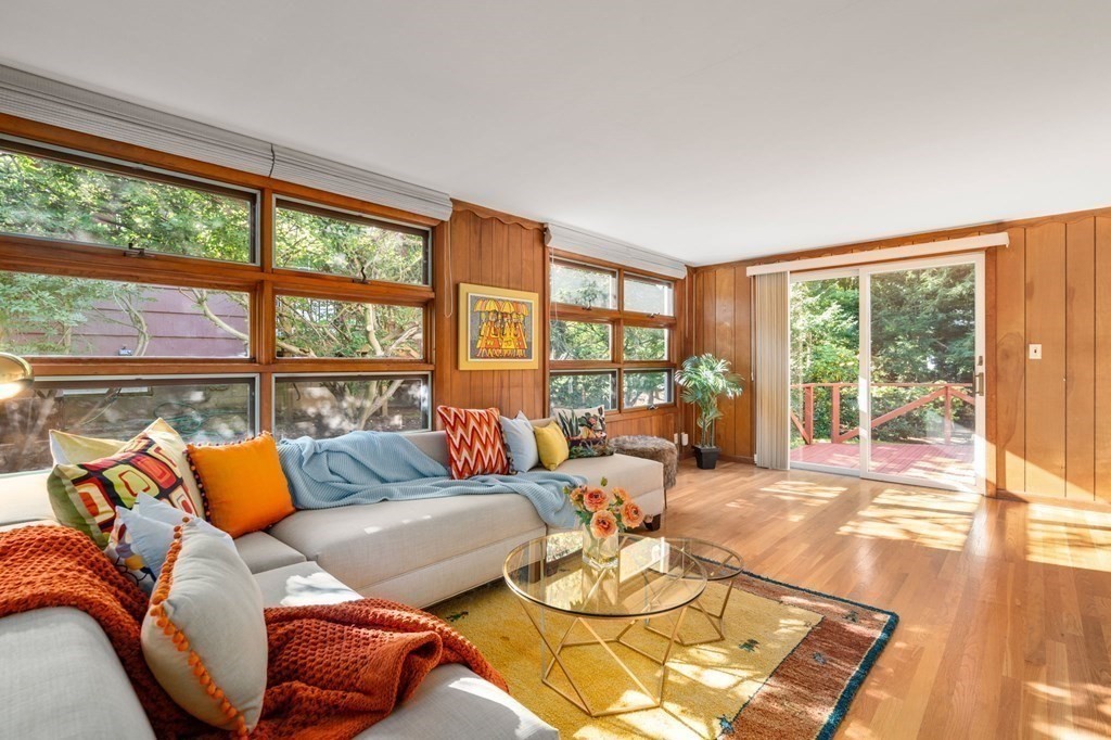 49 Pierrepont Road Newton, MA 02462 - Photo 8 of 16 a living room with furniture and a large window