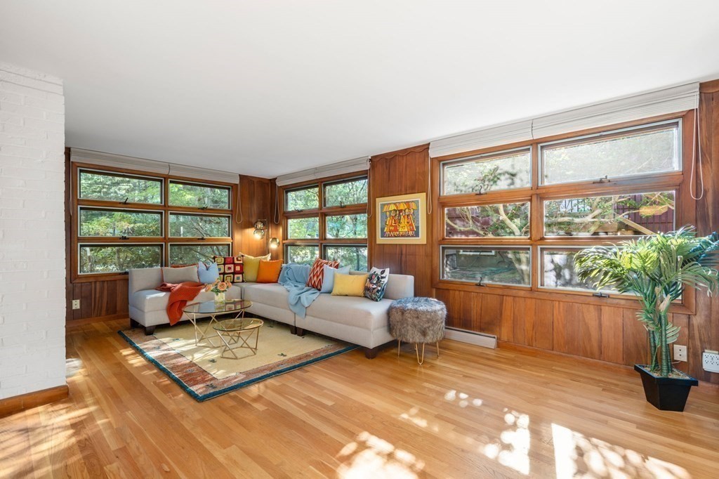 49 Pierrepont Road Newton, MA 02462 - Photo 9 of 16 a living room with furniture and a large window
