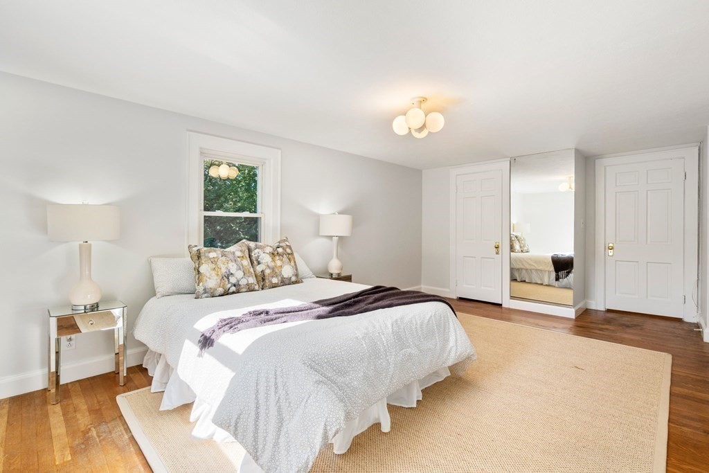 49 Pierrepont Road Newton, MA 02462 - Photo 10 of 16 a bedroom with a bed and a window