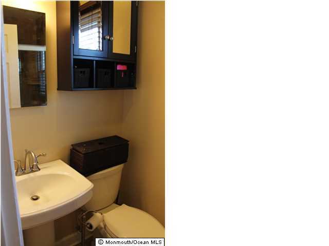 23 Pittsfield Road Howell, NJ 07731 - Photo 13 of 24 a bathroom with a toilet and a sink