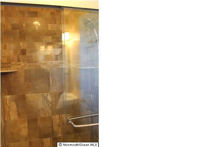 23 Pittsfield Road Howell, NJ 07731 - Photo 14 of 24 a bathroom with a shower