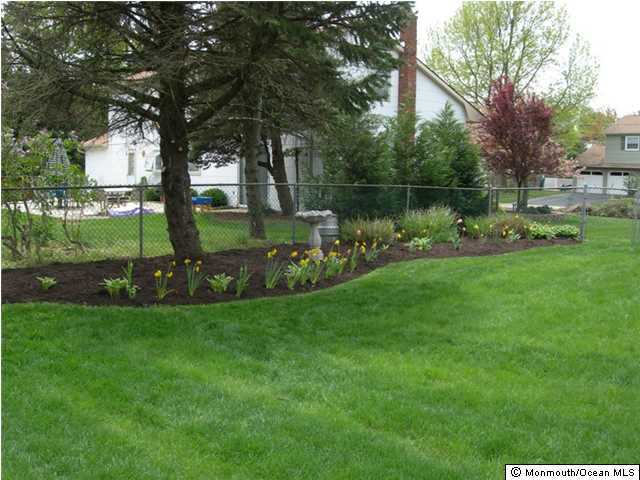 23 Pittsfield Road Howell, NJ 07731 - Photo 20 of 24 a view of a park with large trees