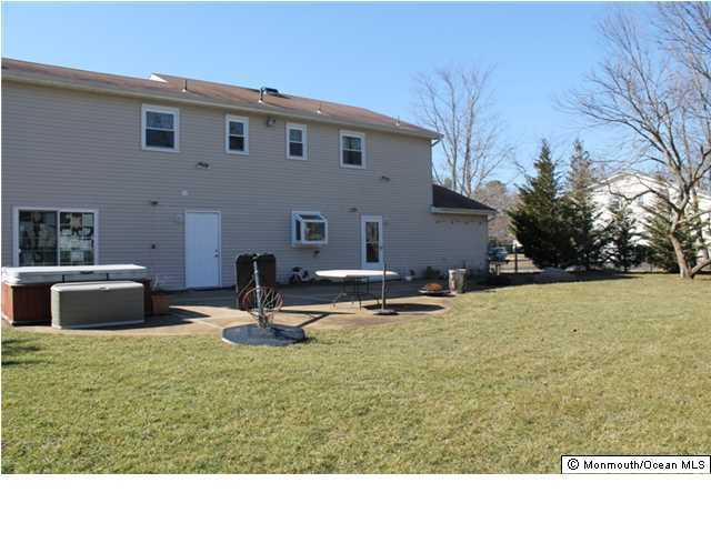 23 Pittsfield Road Howell, NJ 07731 - Photo 23 of 24 a swimming pool with outdoor seating
