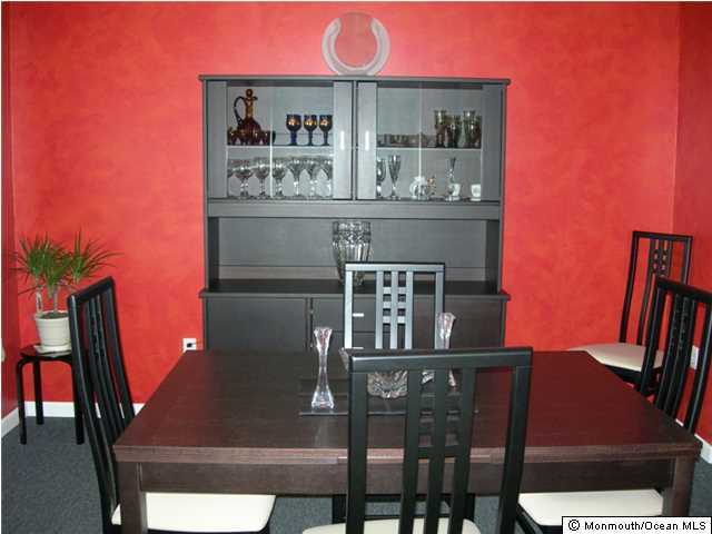 23 Pittsfield Road Howell, NJ 07731 - Photo 8 of 24 a kitchen with table and chairs