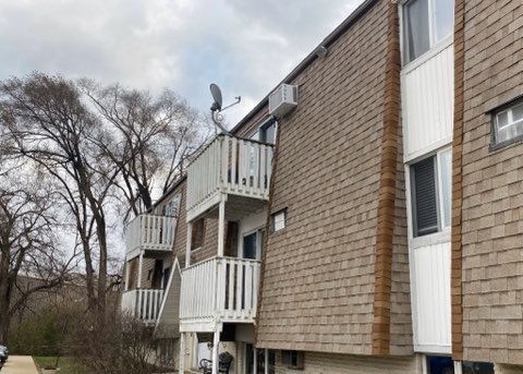 2356 Gaylord Road, Unit 3C Crest Hill, IL 60403 - Photo 2 of 9 a view of a house with a yard