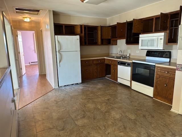 2356 Gaylord Road, Unit 3C Crest Hill, IL 60403 - Photo 4 of 9 a kitchen with a refrigerator sink and stove