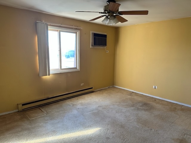 2356 Gaylord Road, Unit 3C Crest Hill, IL 60403 - Photo 5 of 9 an empty room with windows and fan