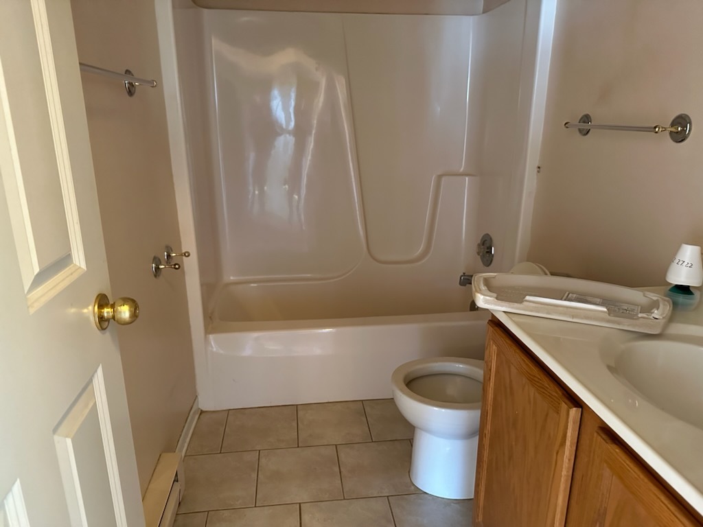 2356 Gaylord Road, Unit 3C Crest Hill, IL 60403 - Photo 7 of 9 a bathroom with a sink a toilet and shower